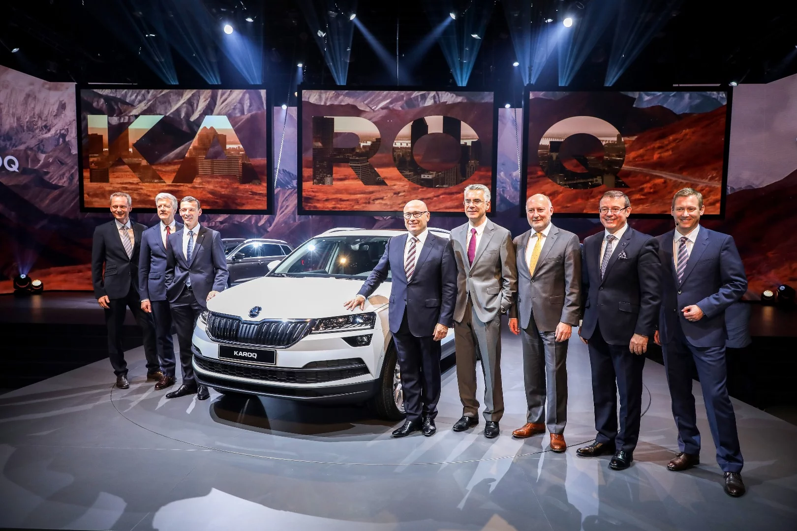 Skoda executives alongside the Karoq at its launch