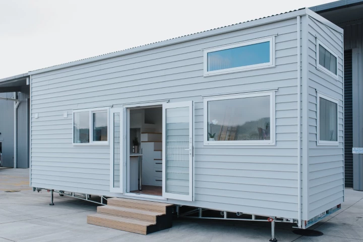 The Dance Tiny House was delivered as a turnkey build excluding appliances and cost around NZD 114,000 (roughly US$75,000)