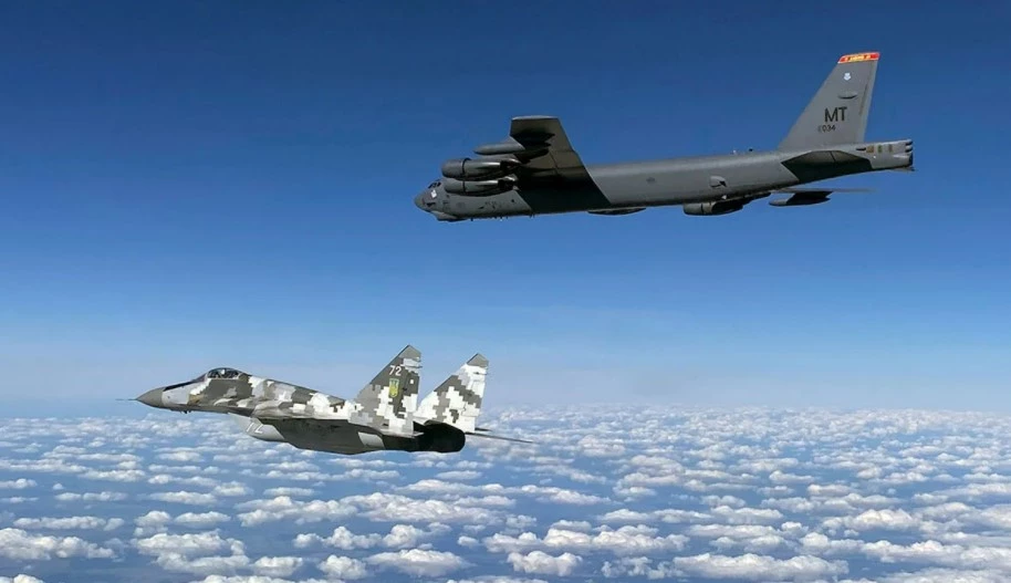 Ukrainian MiG-29 escorted by a B-52