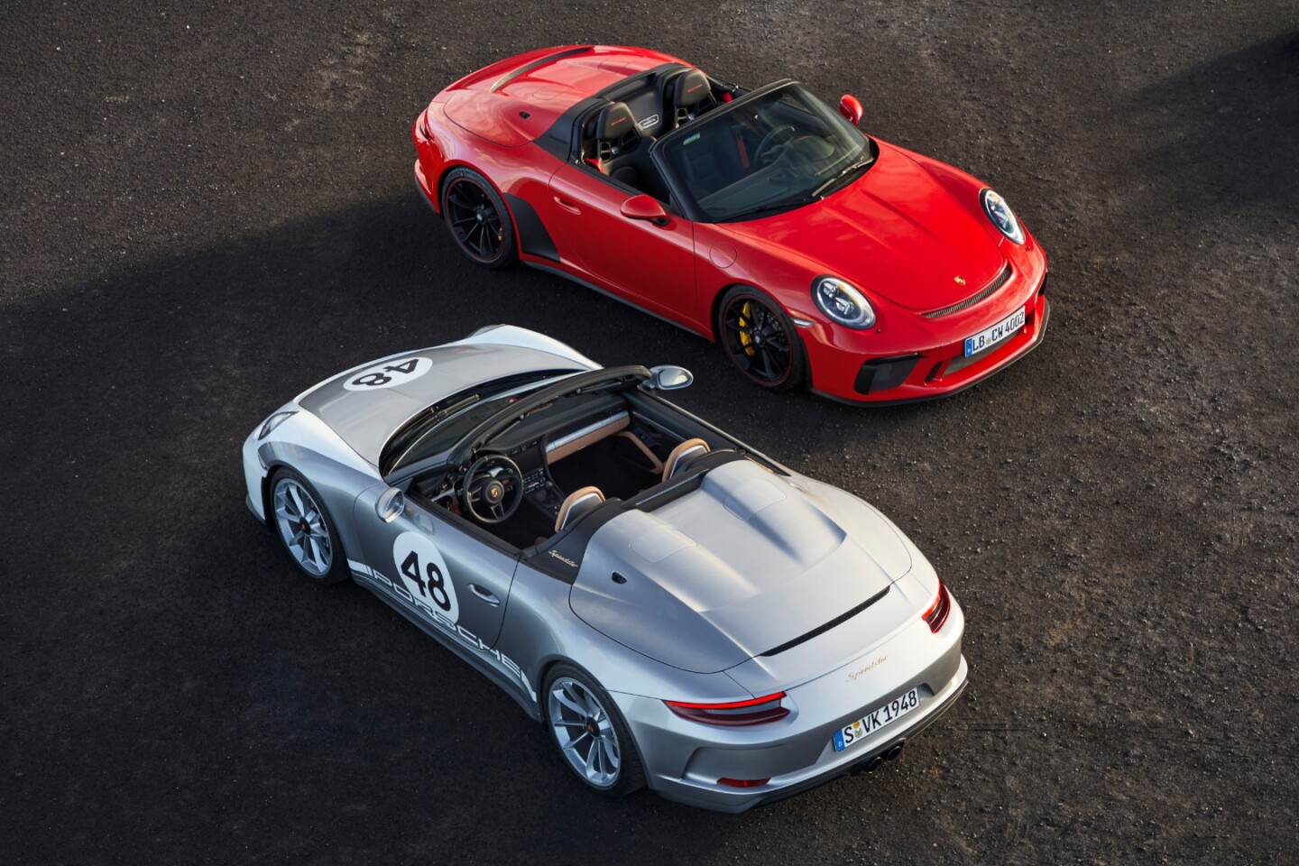 Silver and red versions with their rooves down