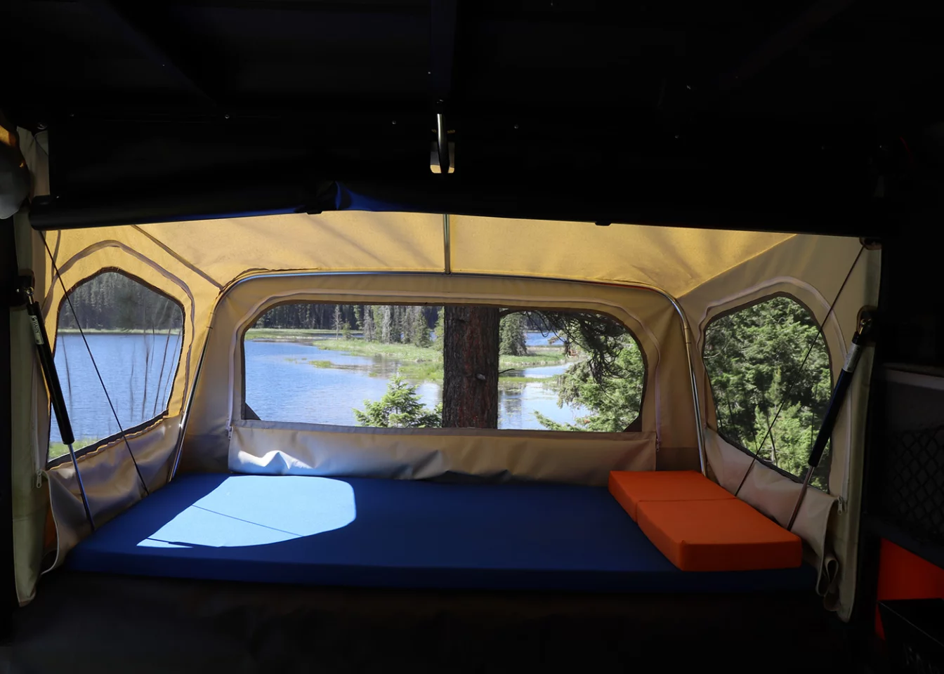 Each side fold-out houses a 2-in-thick double mattress