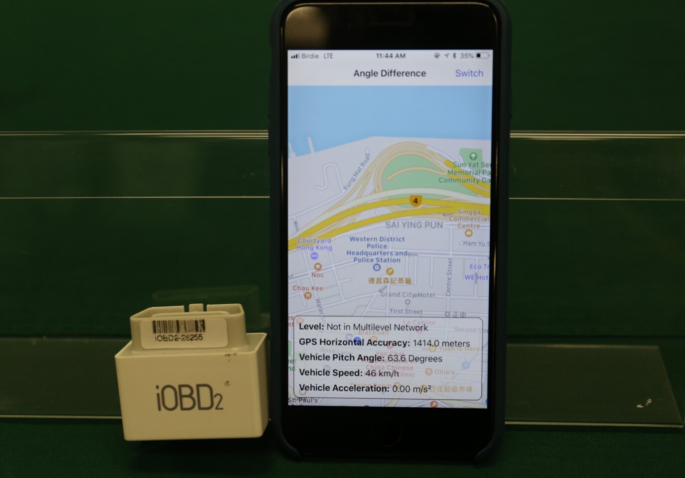 The Angle Difference Method utilizes an in-vehicle smartphone running a navigation app, which is linked by Bluetooth to the car's built-in or plug-in onboard diagnostic device