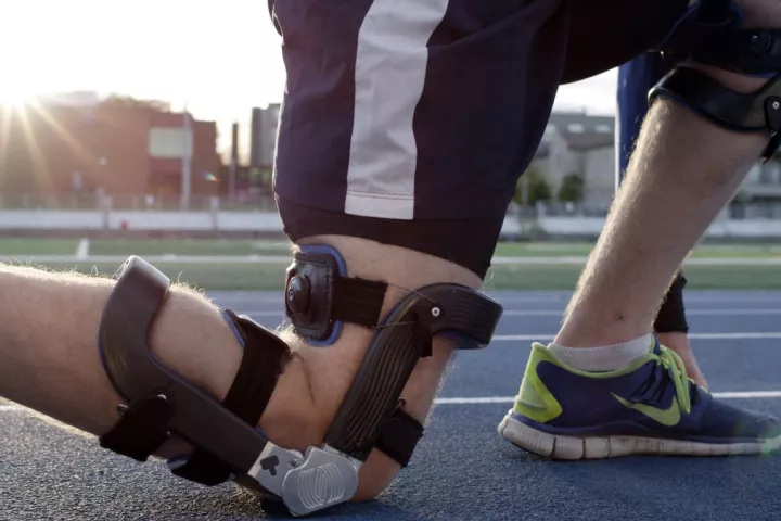 The Levitation brace helps bend the user's knees back forward when walking or running