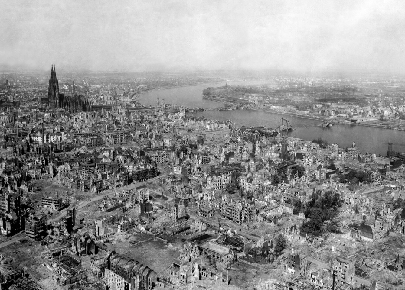 Cologne Cathedral stands seemingly undamaged while entire area surrounding it is completely devastated after Allied bombing raids