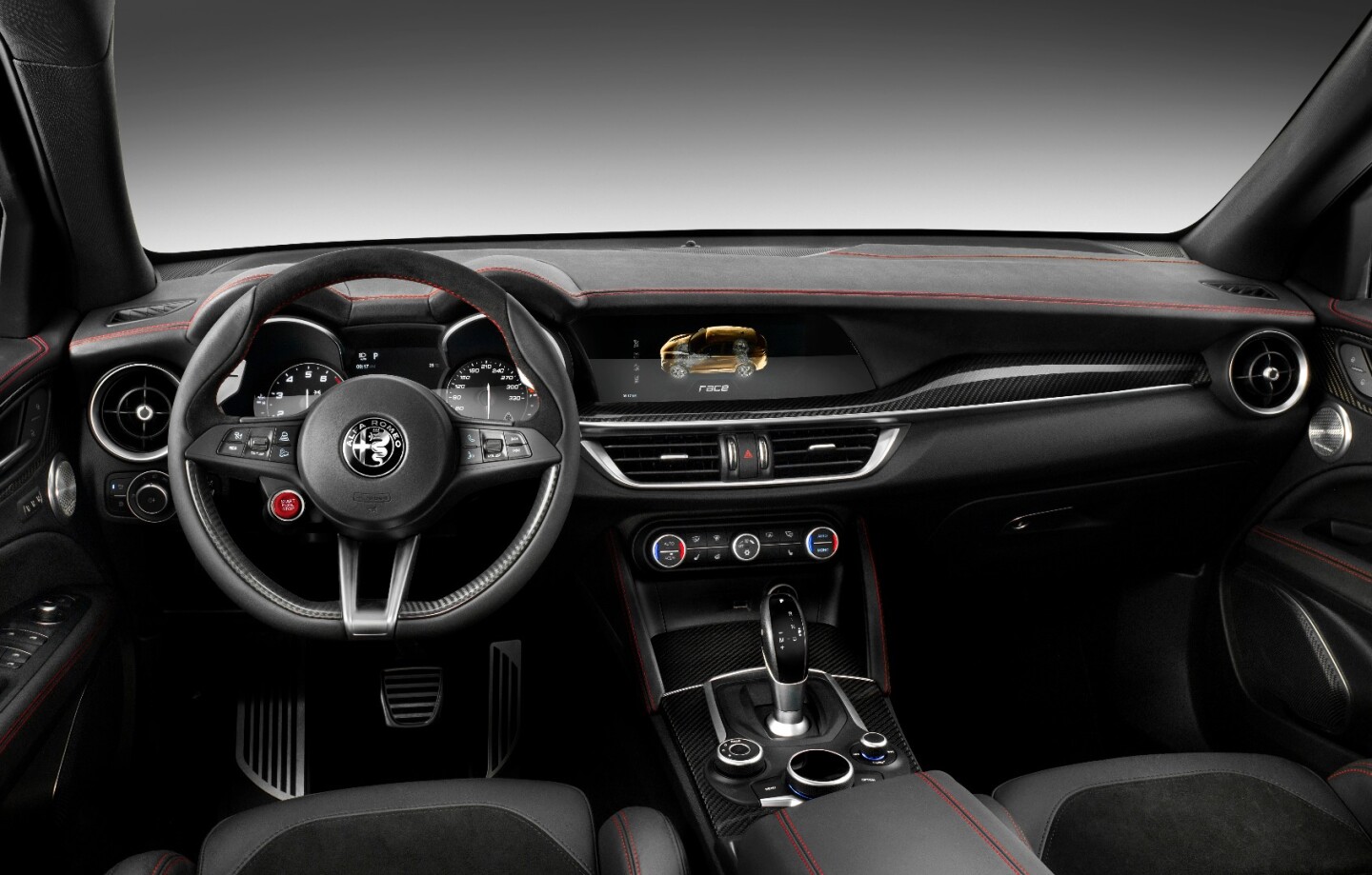 The Stelvio is the same as the Giulia from behind the wheel