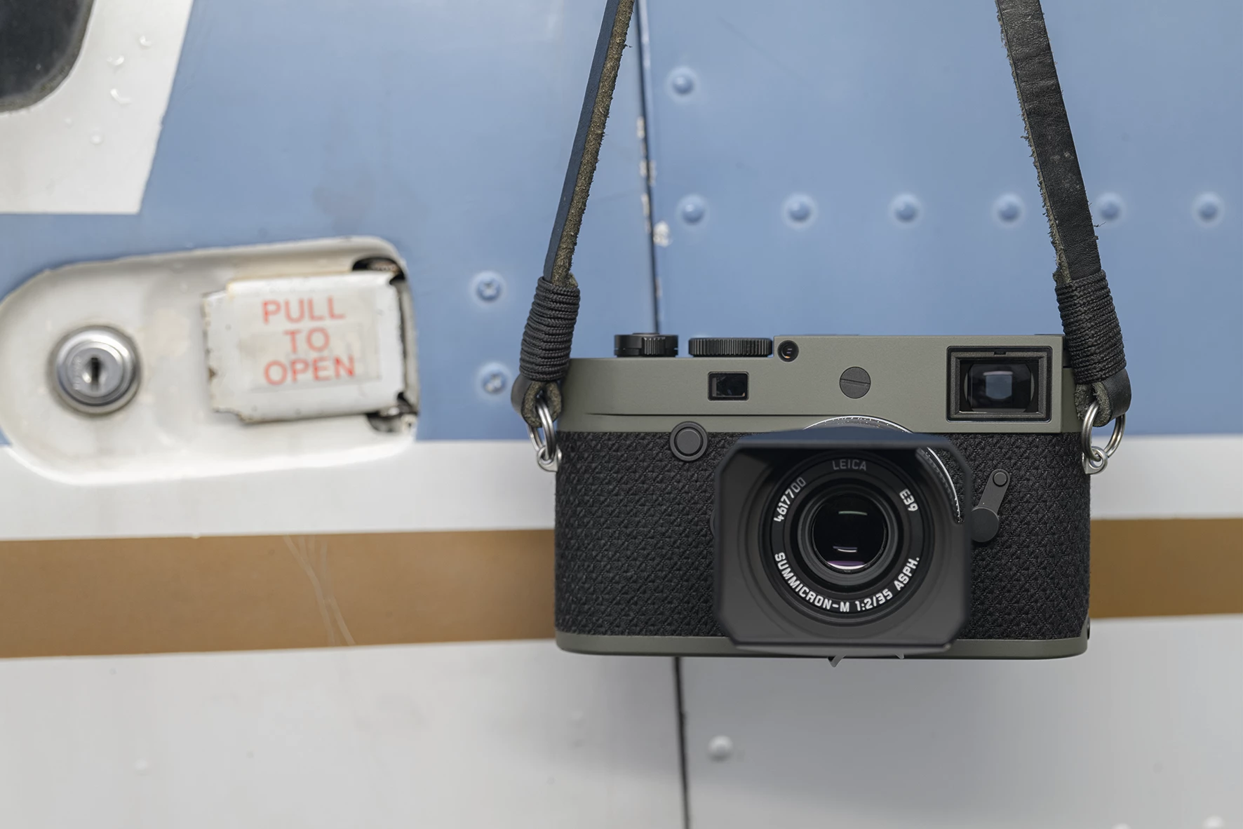 Leica says that the black Kevlar trim will eventually change to the green of the top and bottom plates, when naturally exposed to UV rays