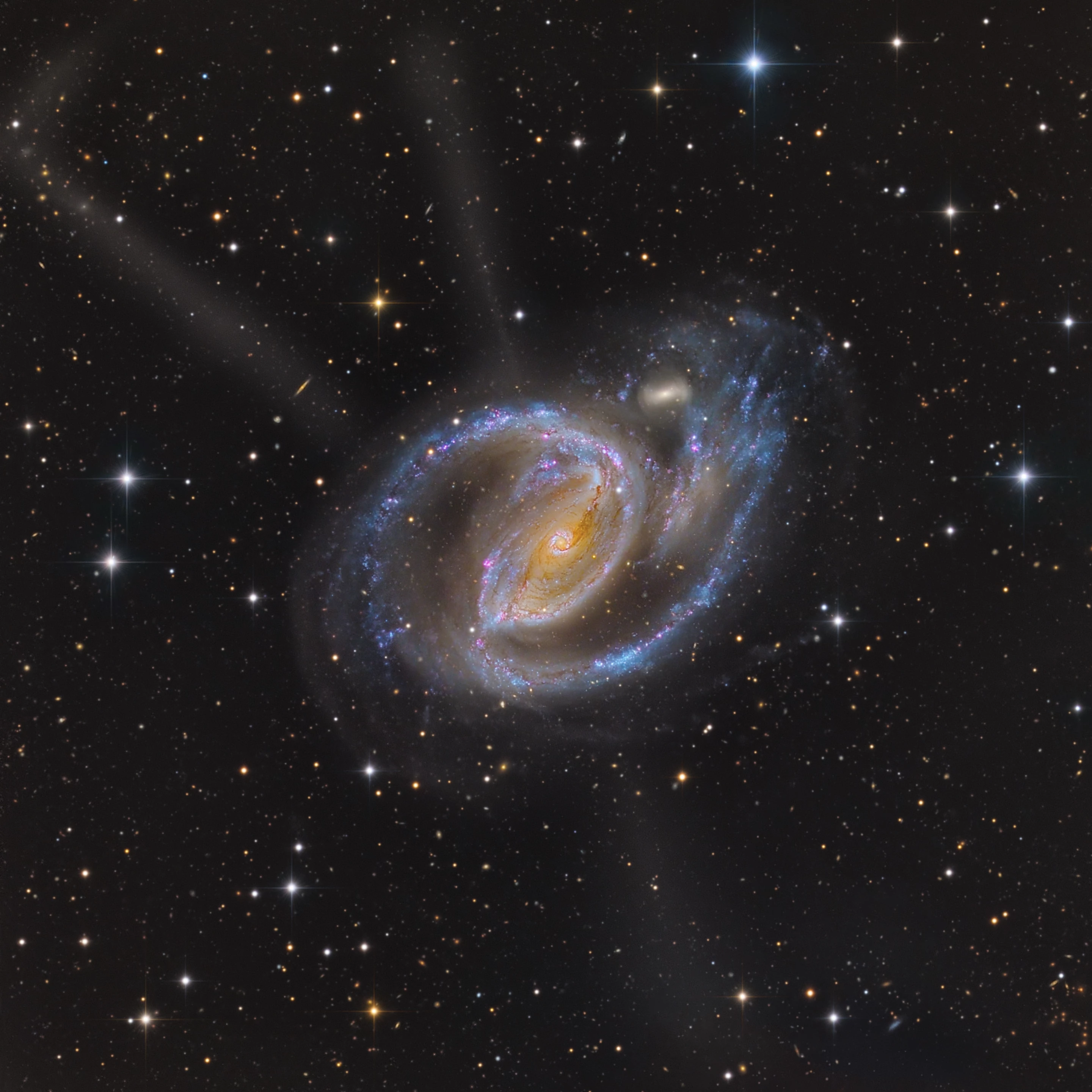 NGC 1097 and Tidal Tails by Mark Hanson and Mike Selby, taken in Río Hurtado, Chile. Shortlisted in the Galaxies category
