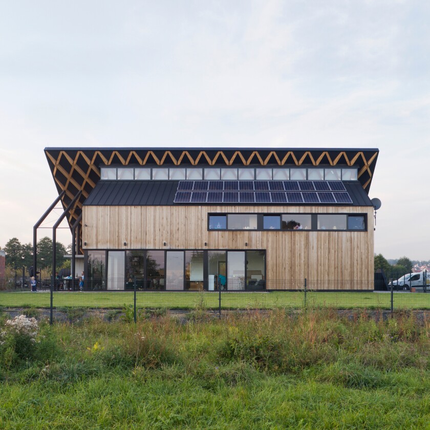 House behind the Roof is located in a suburban area in Krakow, Poland
