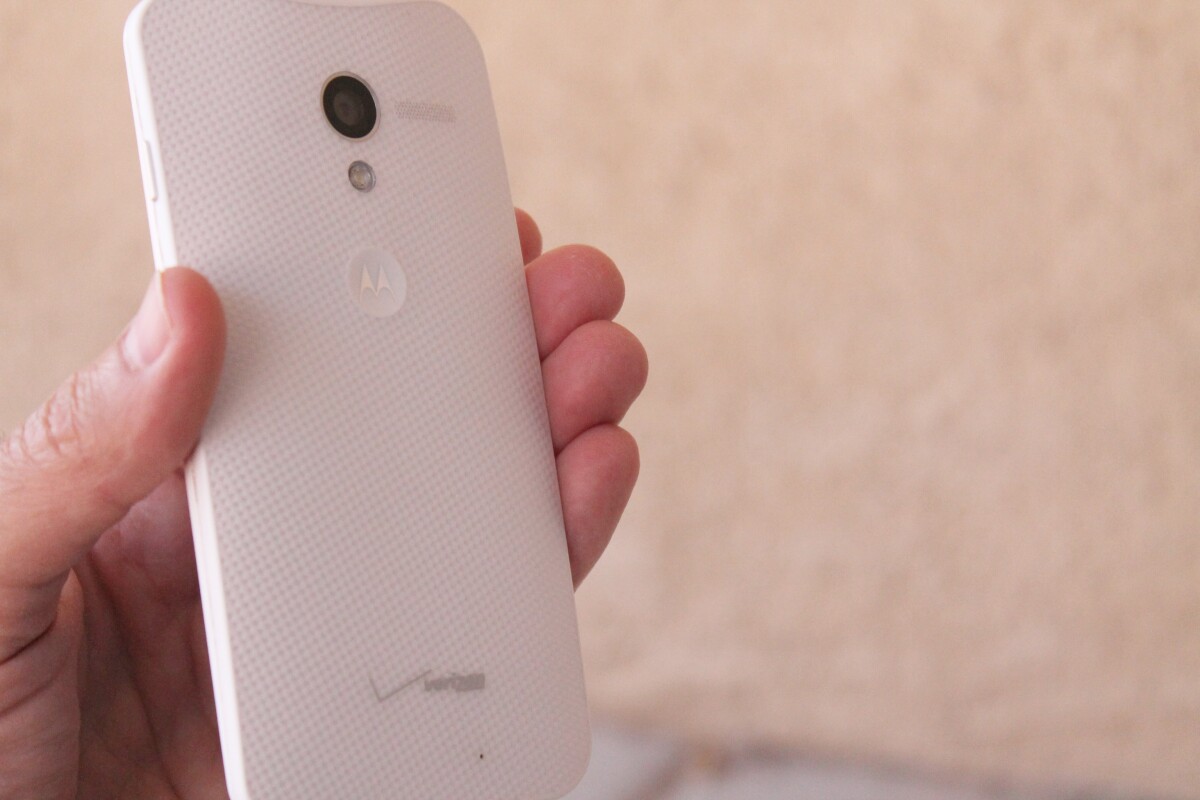 The Moto X has a dimple on its back, where the Motorola logo lies