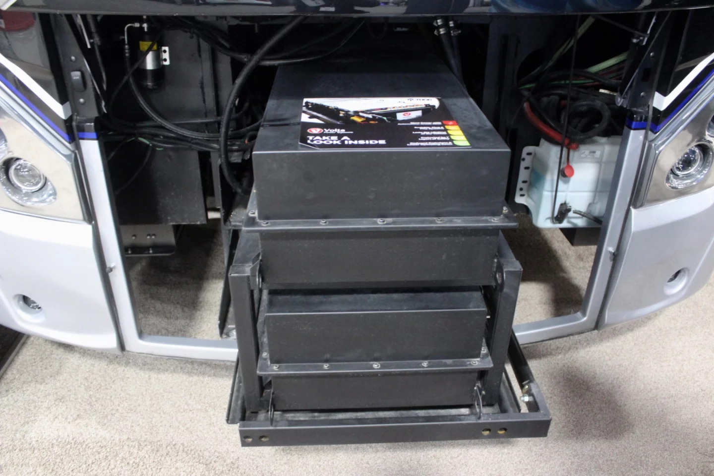 The Tuscany Lithium concept packs 36,400 Wh of lithium power between the headlights; like the generator on the production Tuscany, the batteries are affixed to a slide-out