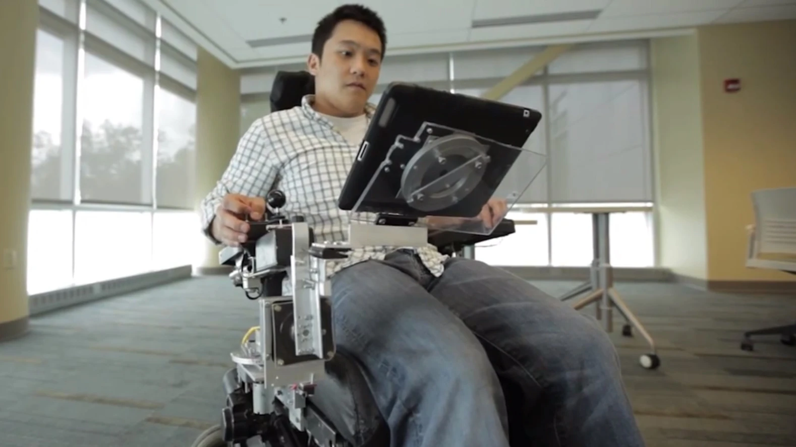 The RoboDesk helps wheelchair users more easily access tablets and lightweight laptop computers