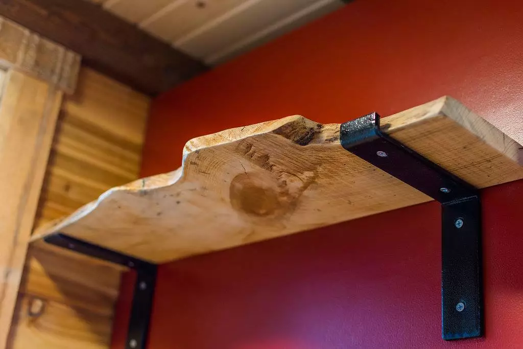 Closeup of the shelving in Davis's 22 ft Off-Grid Tiny Home