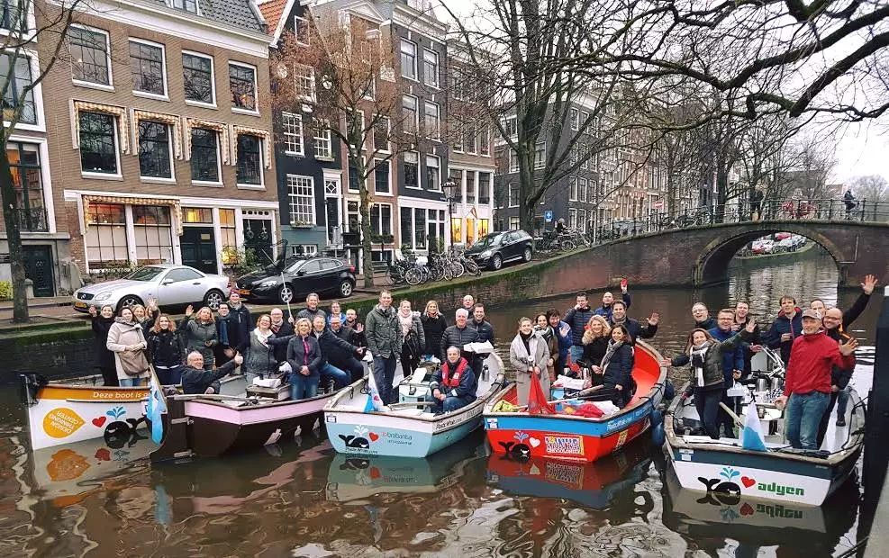 More than 11,000 people have volunteered to help it remove plastic from Amsterdam's canals since Plastic Whale began in 2011