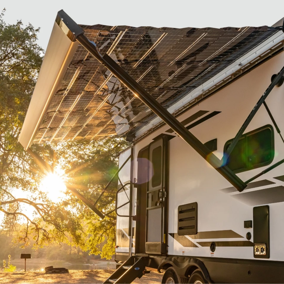 The versatile Xpanse awning can be used as an RV's only awning and solar charger or in conjunction with other awning or solar hardware