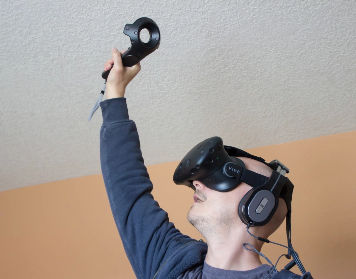 You may be doing this in some Vive games, so hanging lights or ceiling fans may not be a good fit for your playing space