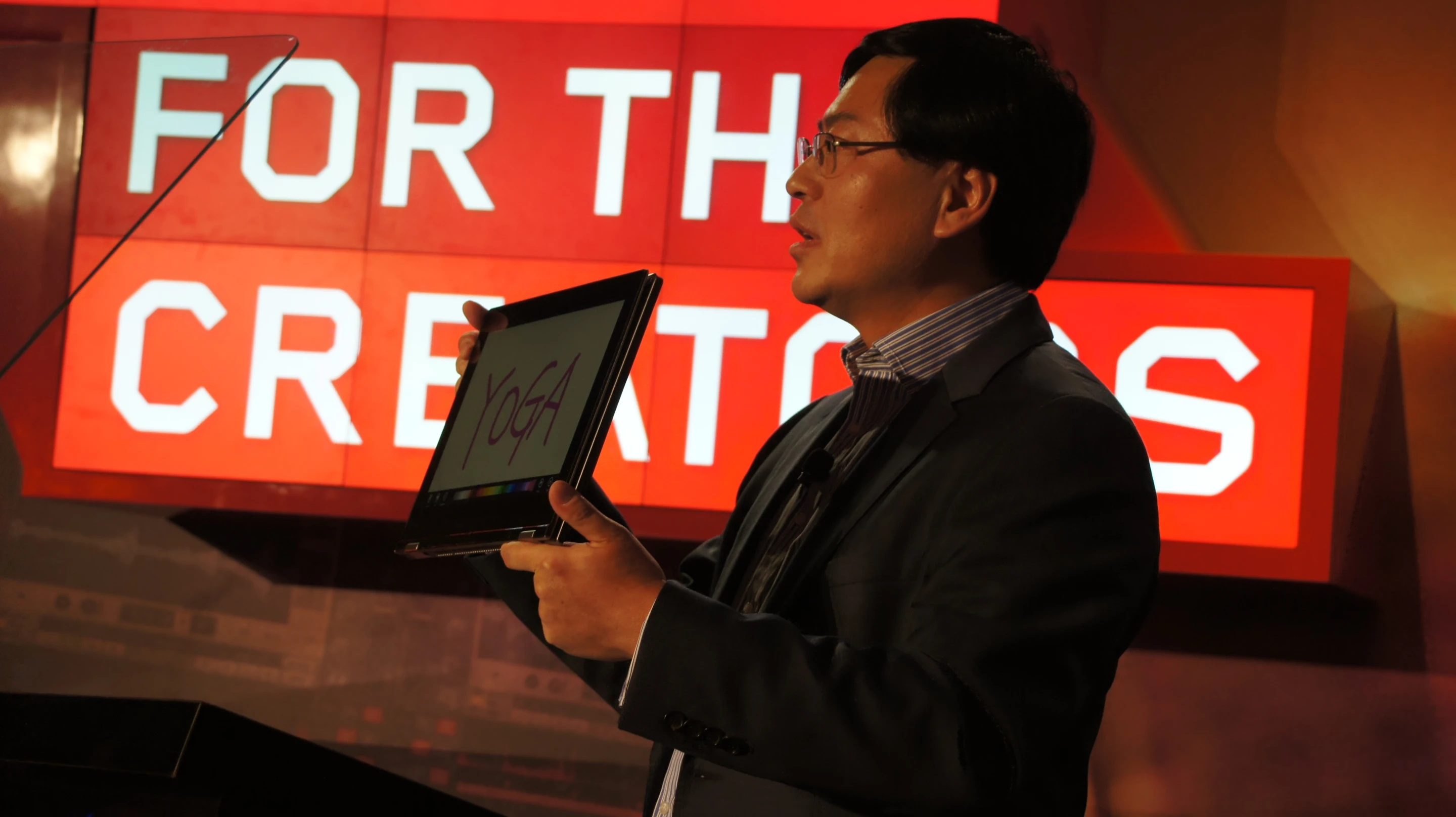 Lenovo CEO Yang Yuanqing shows off the IdeaPad Yoga at CES 2012 (Photo: Lenovo)
