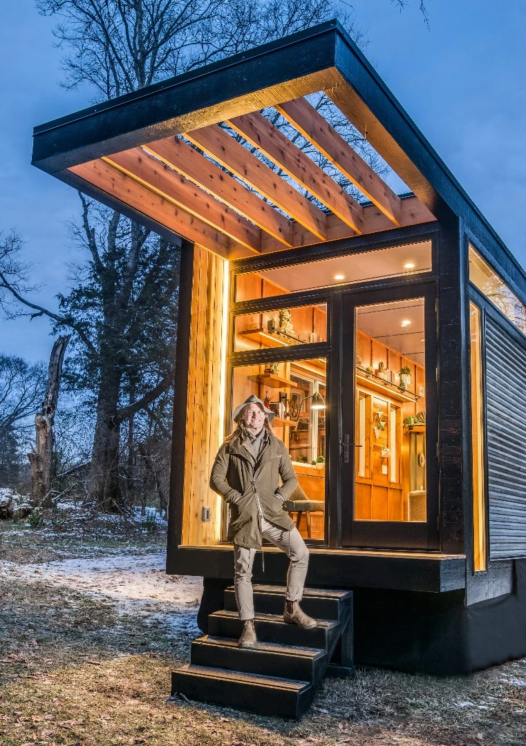 Lead designer of New Frontier Tiny Homes David Latimer, with the Cornelia tiny home