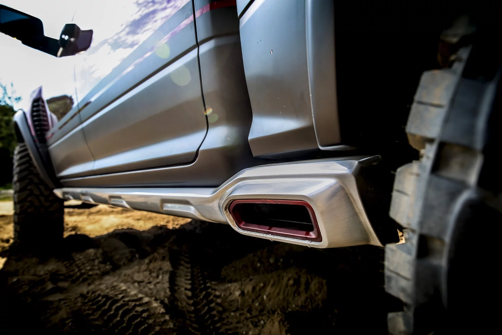 The 5-in exhaust outlets are integrated into the rock rails