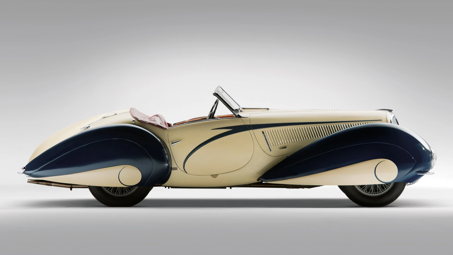 This 1937 Delahaye 135 Competition Court Torpedo Roadster is yet another variation on the teardrop design of Figoni et Falaschi based on the 1936 Paris Auto Show car which was a collaboration between Figoni and the famous illustrator Georges Hamel, or “Geo Ham.” Only 13 of these cars were built and three were fitted with a brass plaque acknowledging Ham's design. This is one of those cars and sold for $6,600,000 by RM-Sotheby's at Amelia Island in 2014.