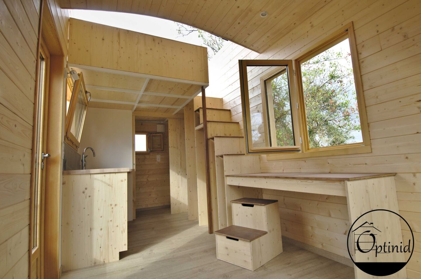 The Marie Ange's compact interior measures roughly 19 sq m (204 sq ft) and has a utilitarian decor of spruce and plywood