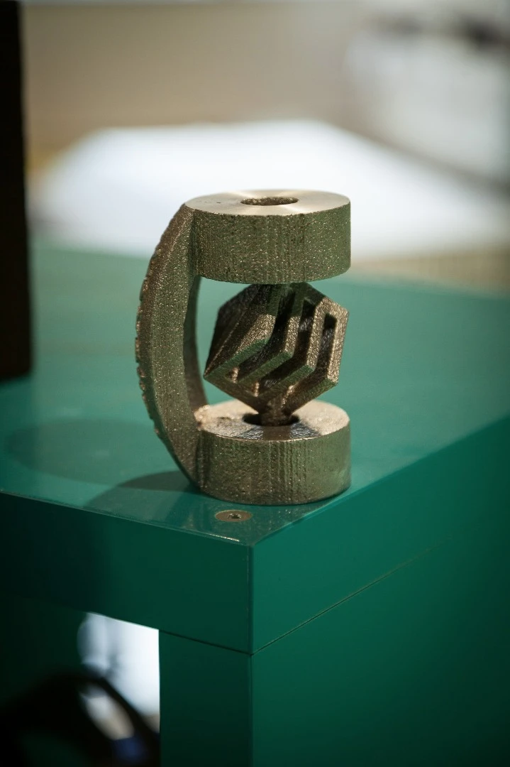Sample parts cast using a sand-printed mold.