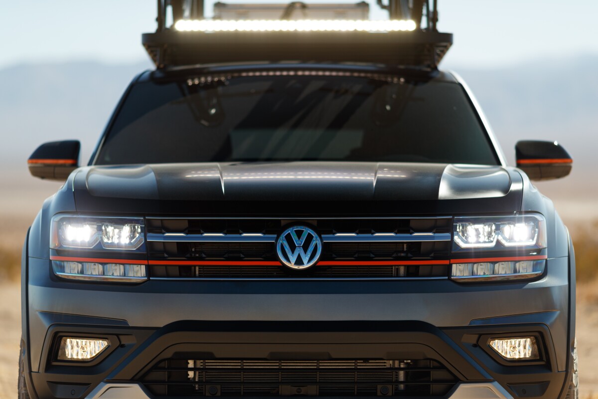 Using a Volkswagen Atlas SEL Premium as its canvas, the Atlas Basecamp Concept is painted Platinum Gray and Black Uni with matte finish and orange accents