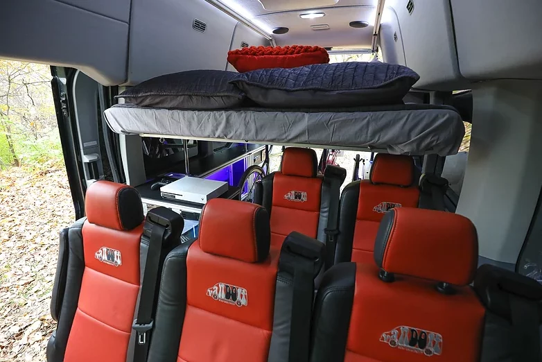 Seven seats, a bed and still room for bikes in back