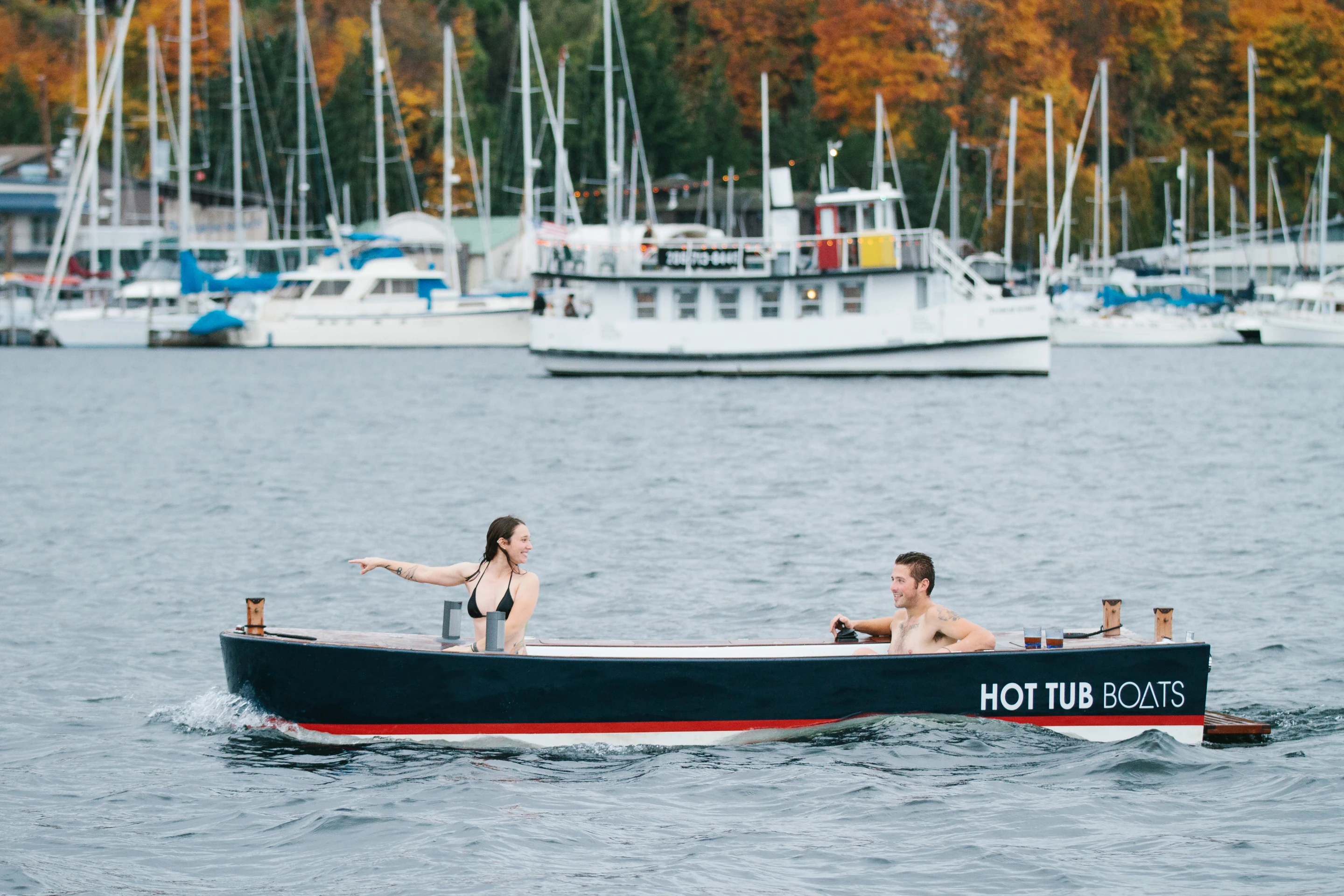The Hot Tub Boat allows its passengers to soak while they cruise