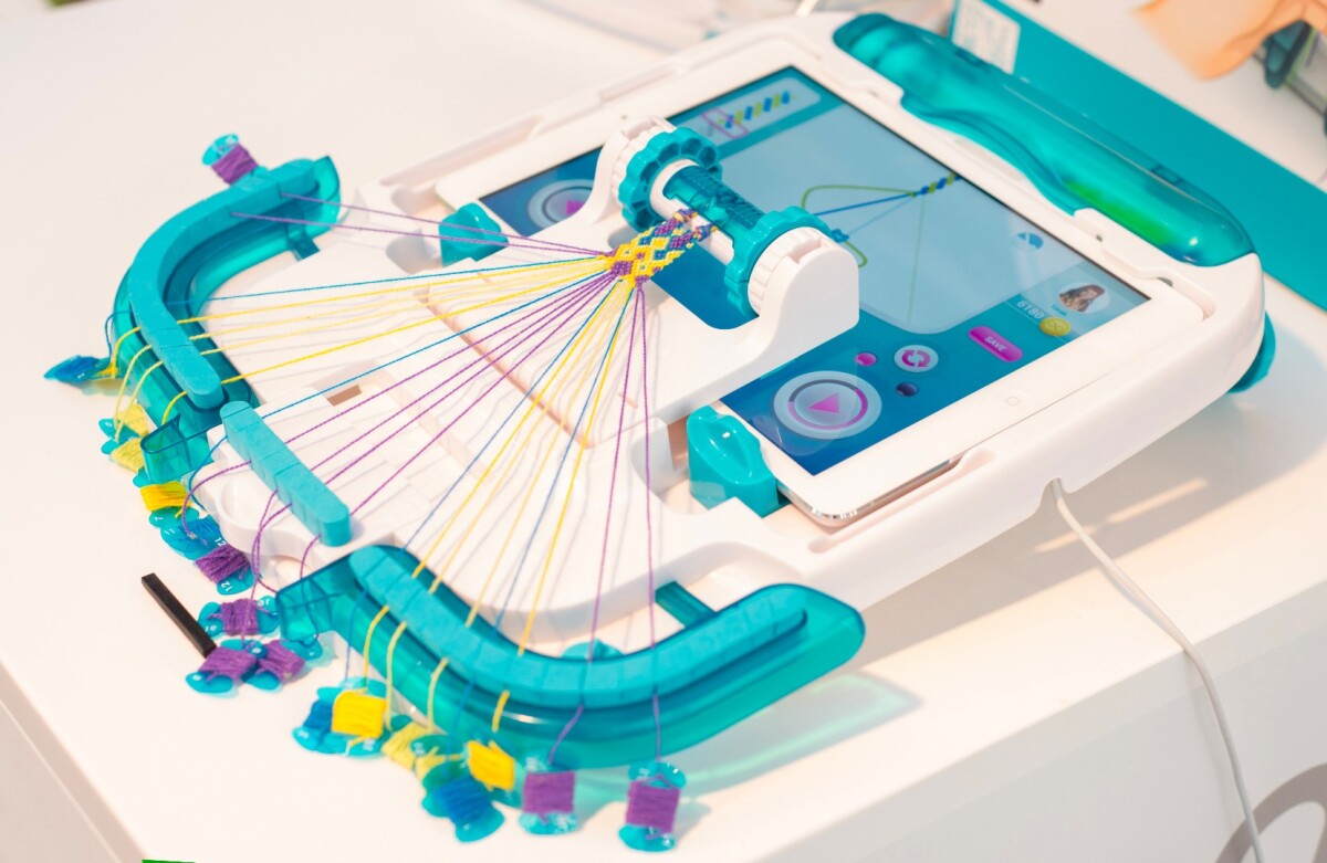 The i-Loom works with an iPad to make producing friendship bracelets easier