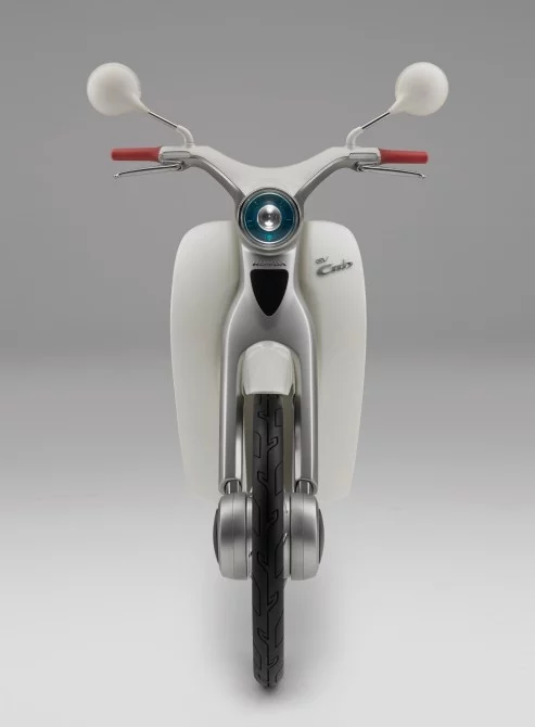 Front on to the EV-Cub electric motorcycle - now that front hub might be a fat drum brake, but our guess is that it houses an electric motor