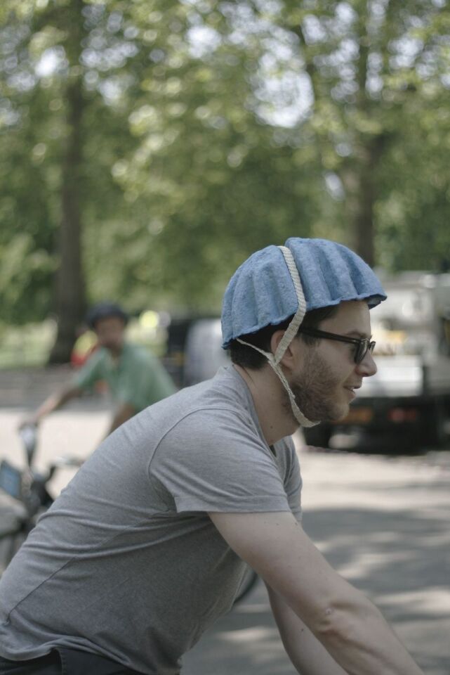 The Paper Pulp Helmet includes large grooves which accommodate the straps and allow the wearer to stay cool