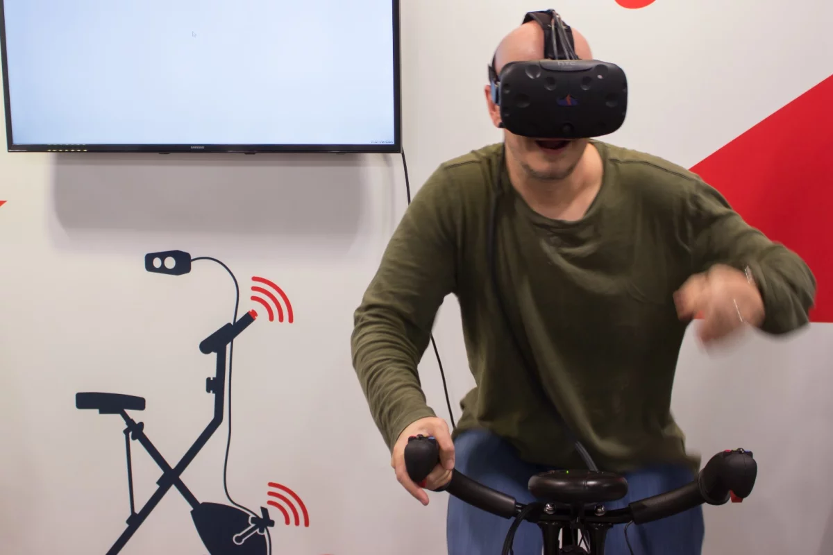VirZoom is a stationary bike that uses the three big (upcoming) VR headsets to gamify and distract