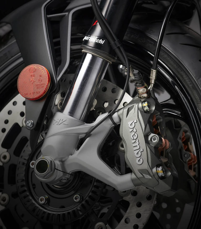 You'll get Brembo 4-pot and 2-pot calipers on the front rear respectively for stopping power, and Marzocchi forks with a Sachs monoshock in the rear for comfort in the saddle