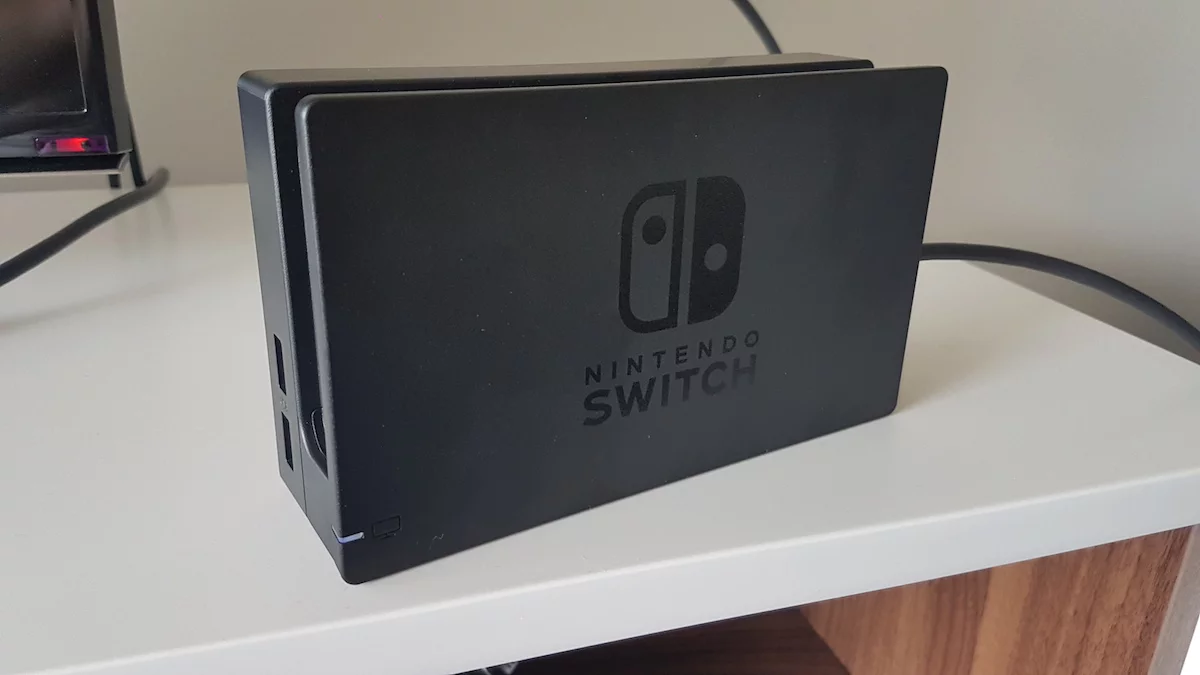 The dock plugs into a TV via HDMI