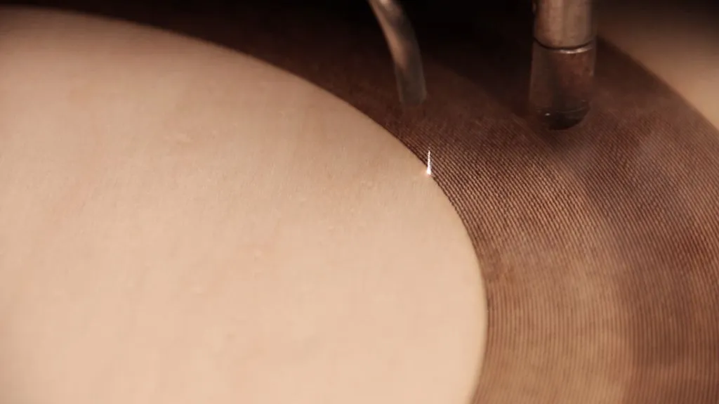 Ghassaei cut her wooden records onto a sheet of maple with an Epilog 120 Watt Legend EXT at an approximate precision of 1200dpi