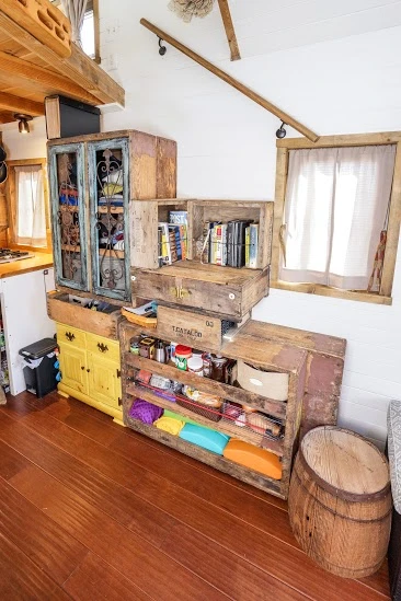 The bookcases and cabinets double as stairs