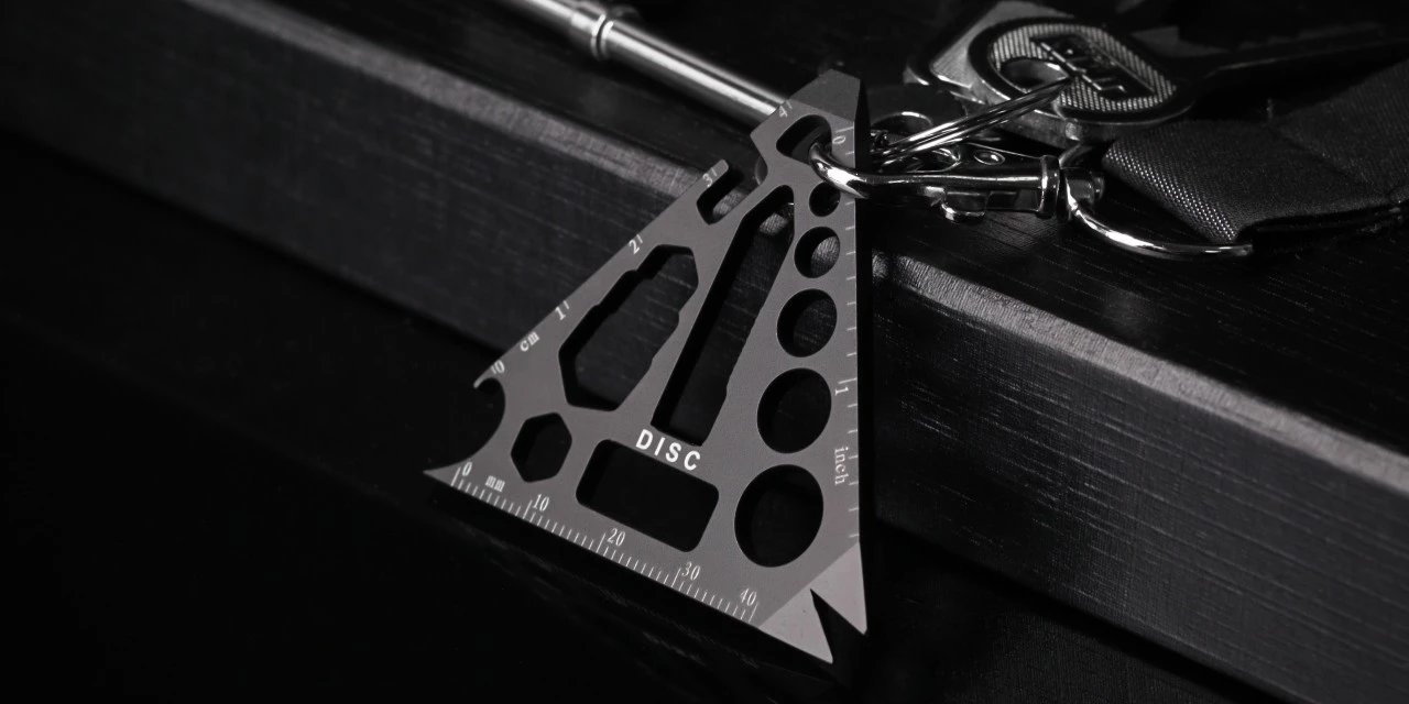 Triangle multitiool has a keyring hole to keep it nearby