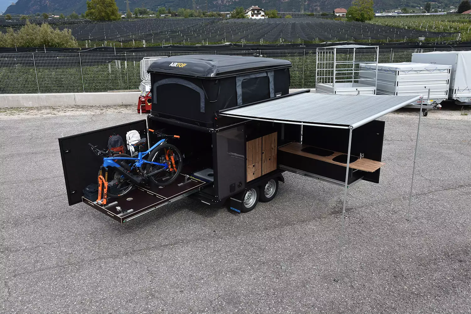 The Freeda packs loads of cargo space, and buyers can equip it with an optional kit for neatly holding bikes, helmets and accompanying accessories