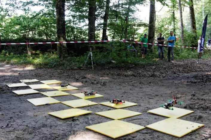 Competing in groups of four, the pilots viewed all the action through pairs of goggles, which were fed a stream from micro-cameras built into the front of the drones