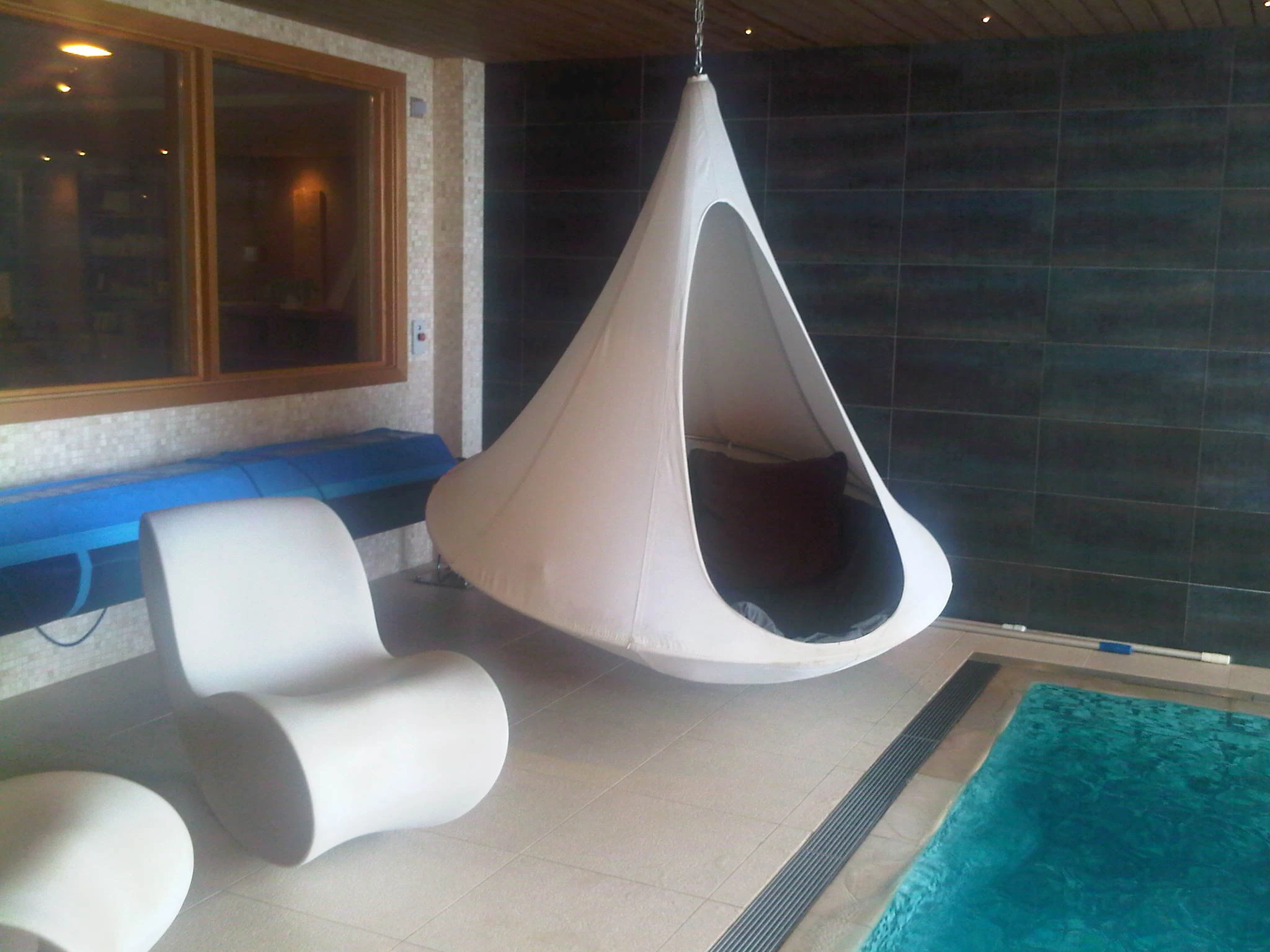 Cacoon is weatherproof and designed to be used anywhere, including above swimming pools