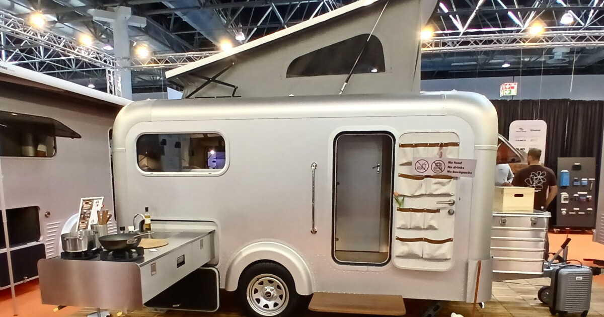 Gorgeous leather-trimmed camper breaks out of its aluminum cube