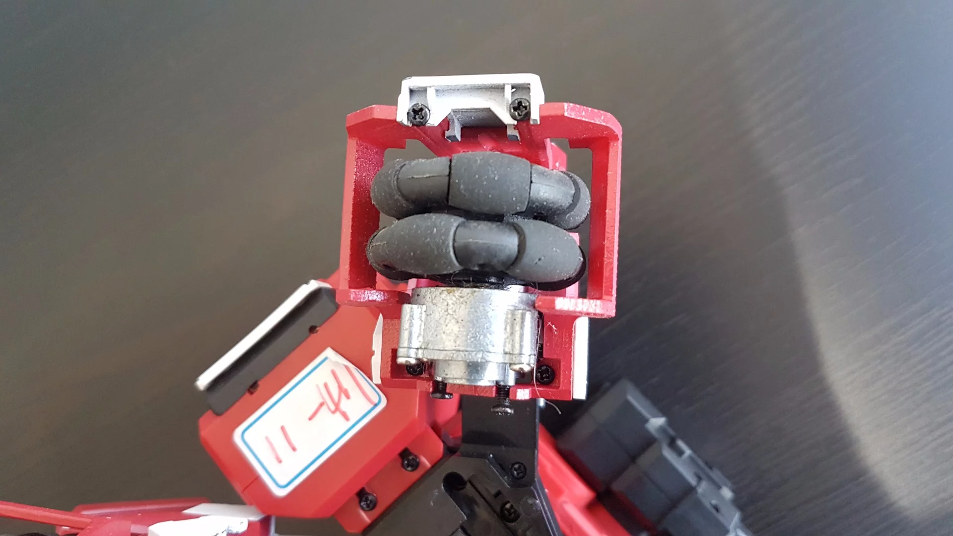 Geio's wheels are omnidirectional, thanks to perpendicular rollers that allow the robot to move forward/backward and sideways at the same time