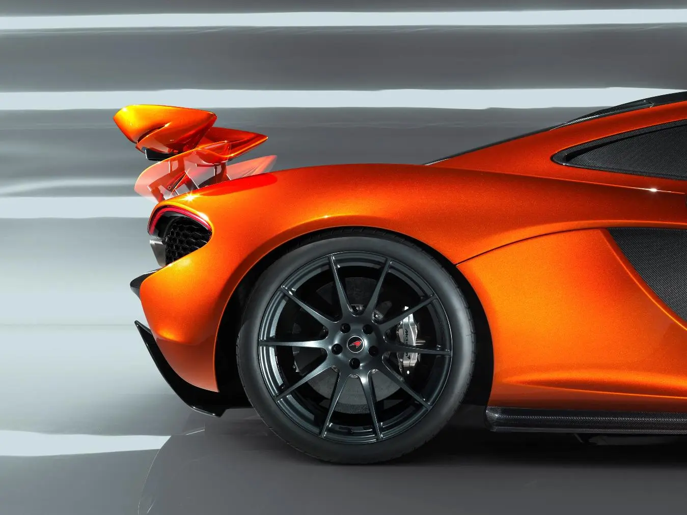 The wing also adjusts in angle to control downforce