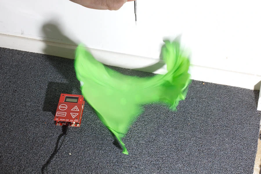The Triggertrap is triggering a couple of Canon 580 EX II flashes when it registers the sound of the balloon's pop - third image