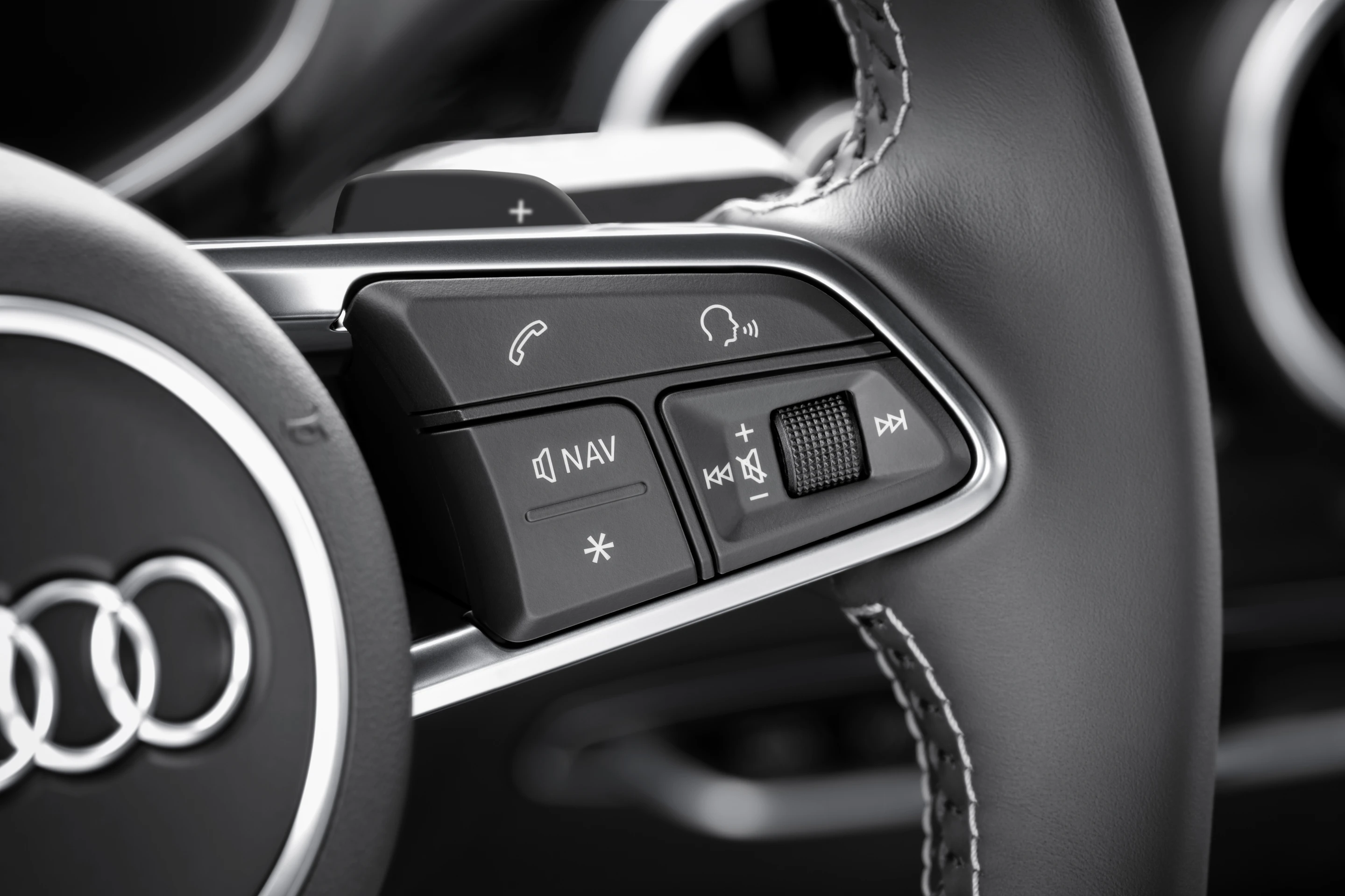 The TT's "virtual cockpit" is controlled by wheel mounted buttons, combined with Audi's rotary MMI dial