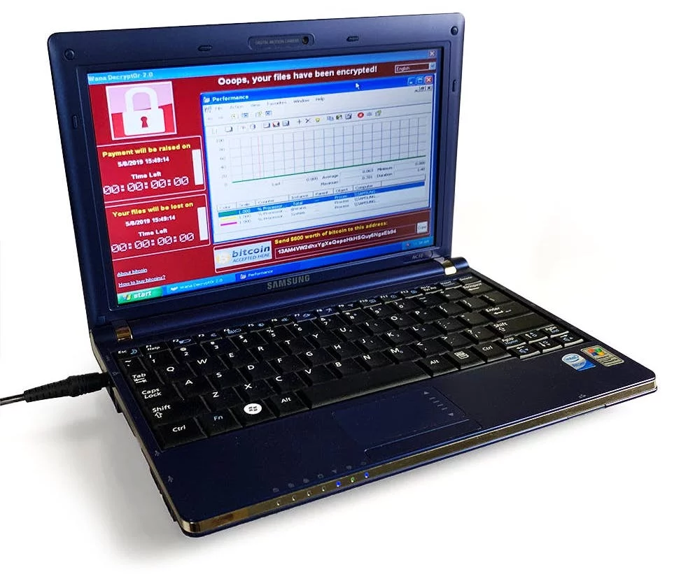 The six pieces of malware on the laptop are WannaCry, Mydoom, Sobig, ILOVEYOU, DarkTequila, and BlackEnergy