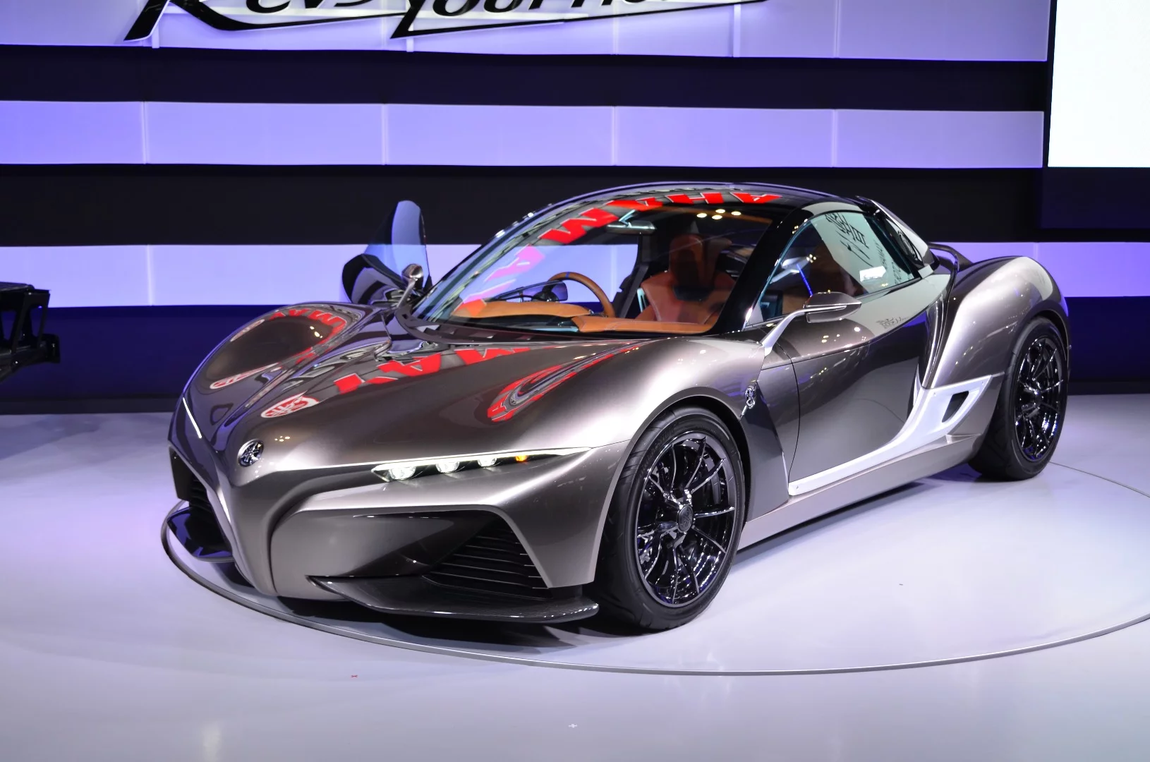 Yamaha's Sports Ride Concept attempts to convey the feeling of riding a motorcycle to a lightweight two-seater sport car
