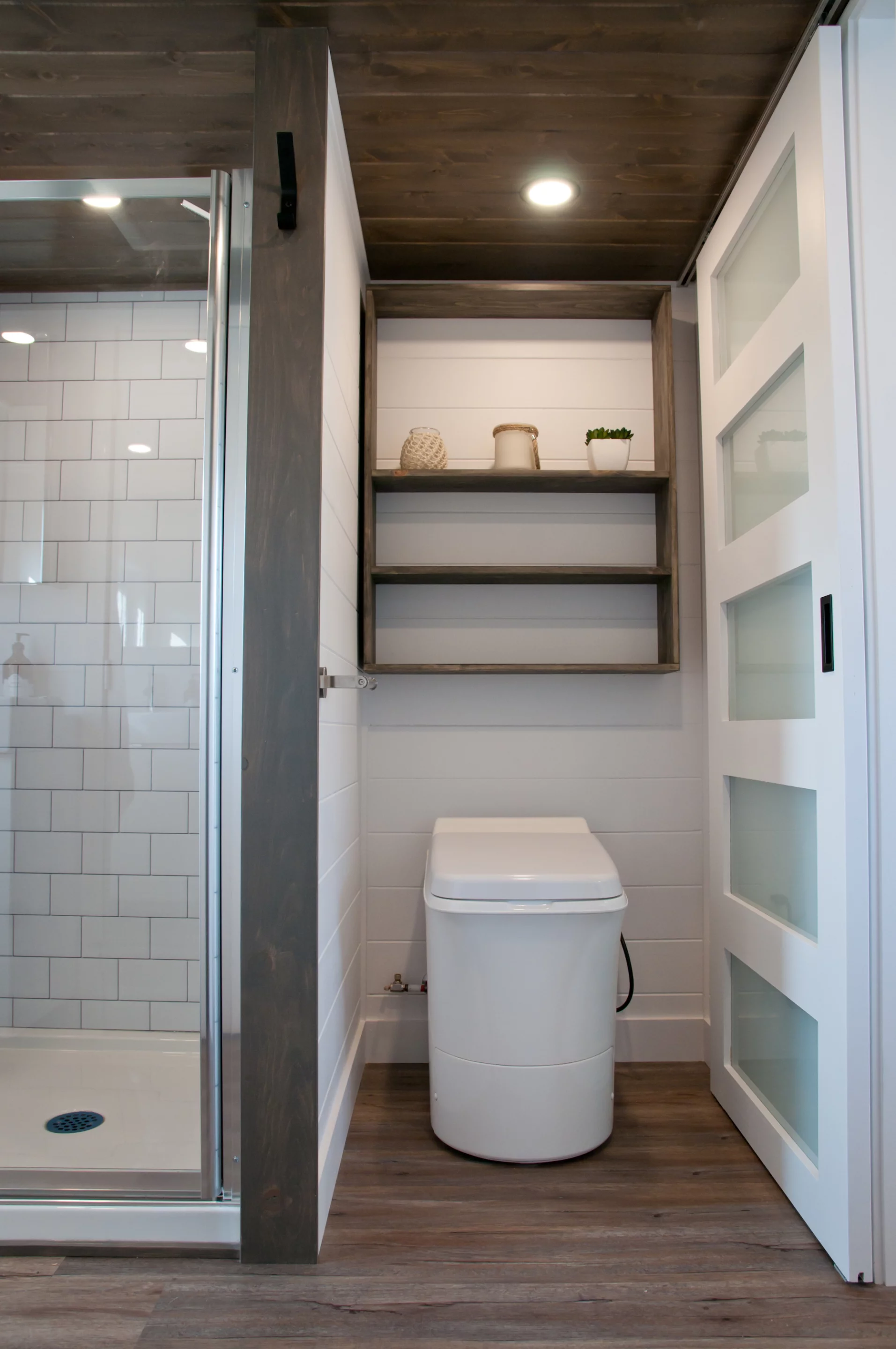 The Baobab's toilet is an incinerator model hooked up to a chimney and turns waste into ash