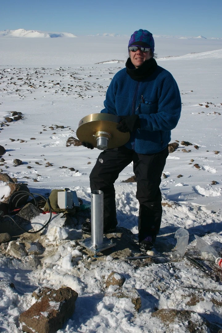Lead author Terry Wilson with a GPS station used in the new study to determine the rate that the bedrock is rising