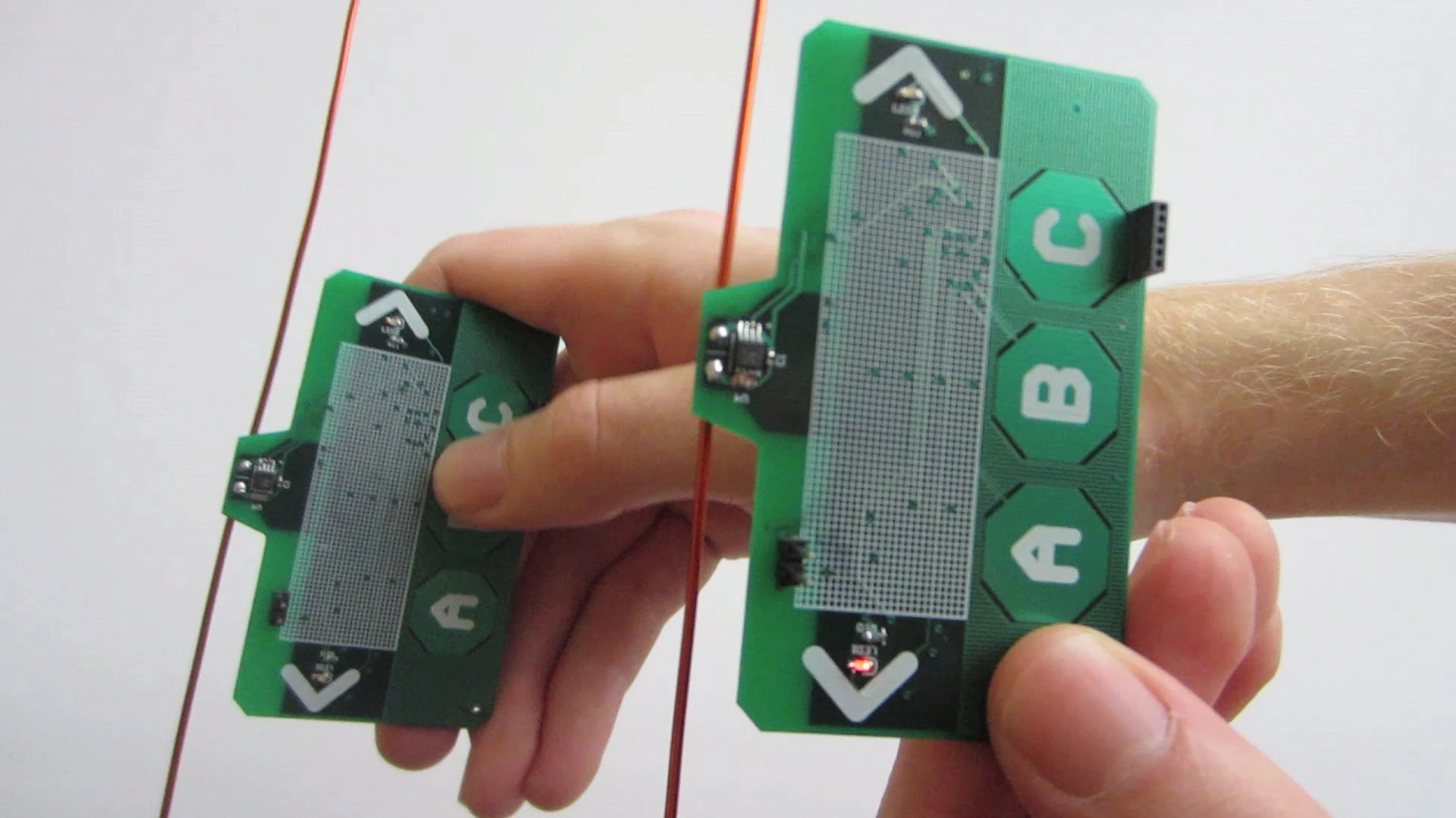 Two ambient backscatter test devices are able to communicate, despite having no batteries or power cords